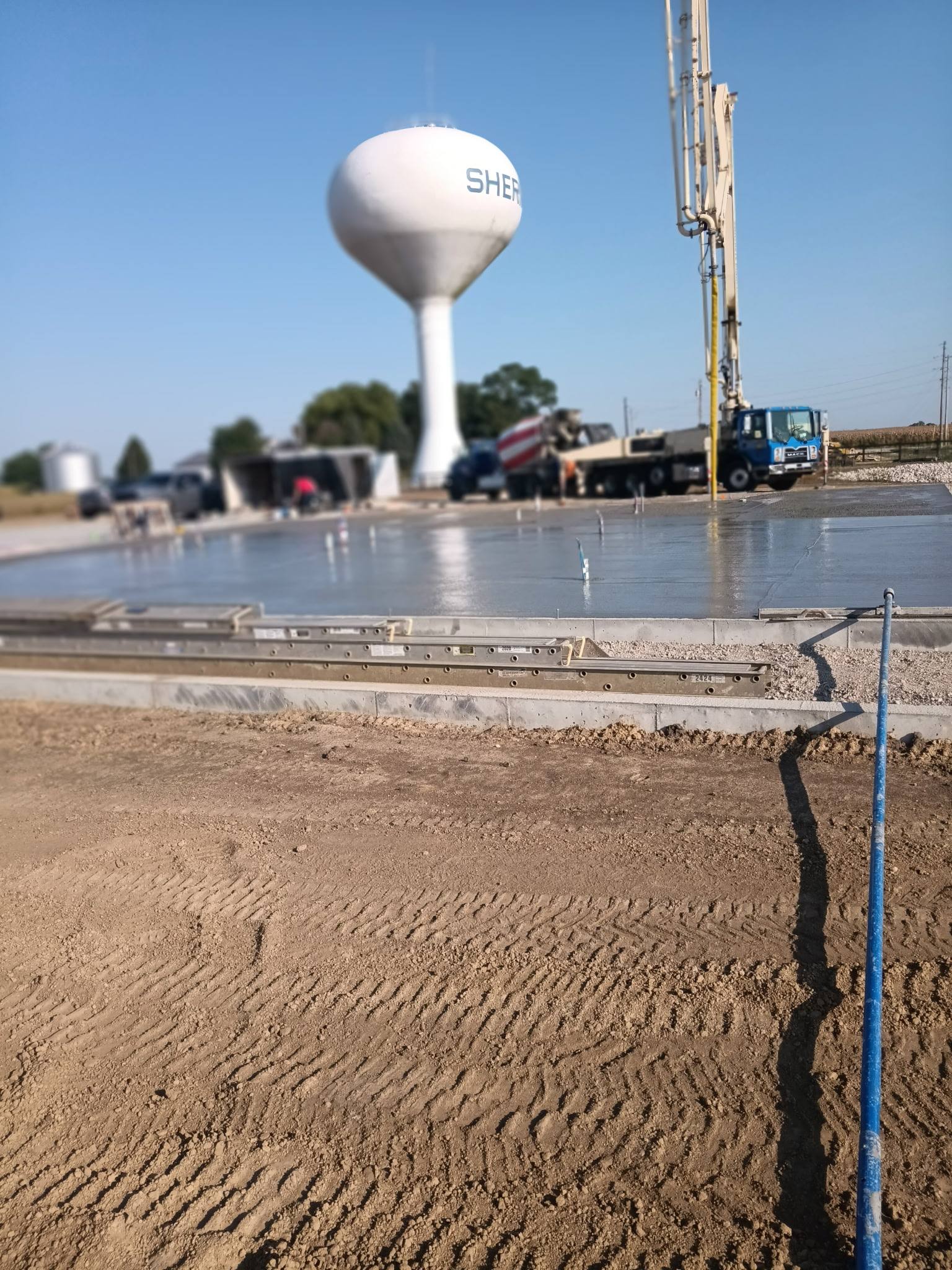 Commercial concrete slab pour with boom pump truck