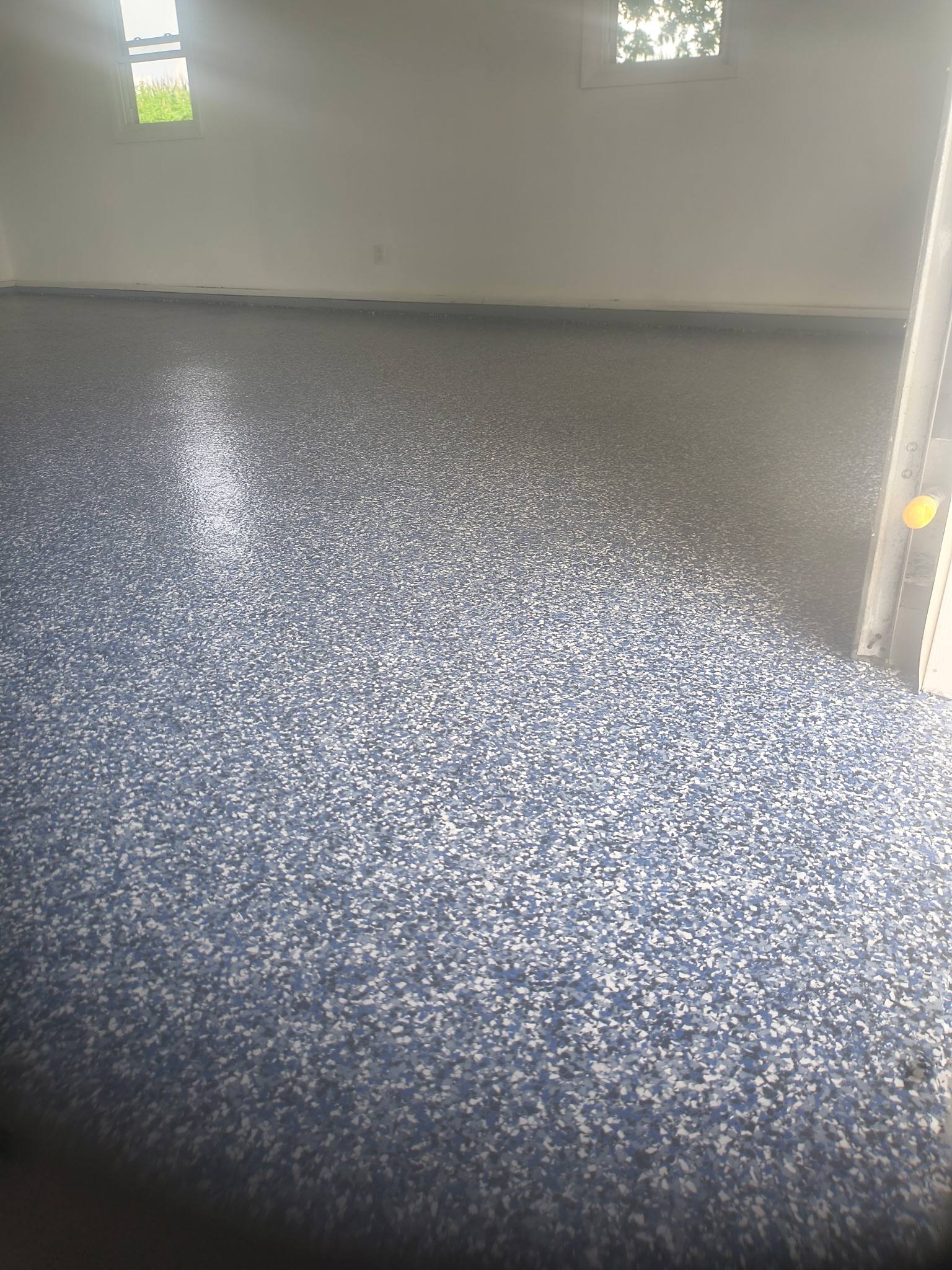 Blue and gray flake epoxy garage floor coating