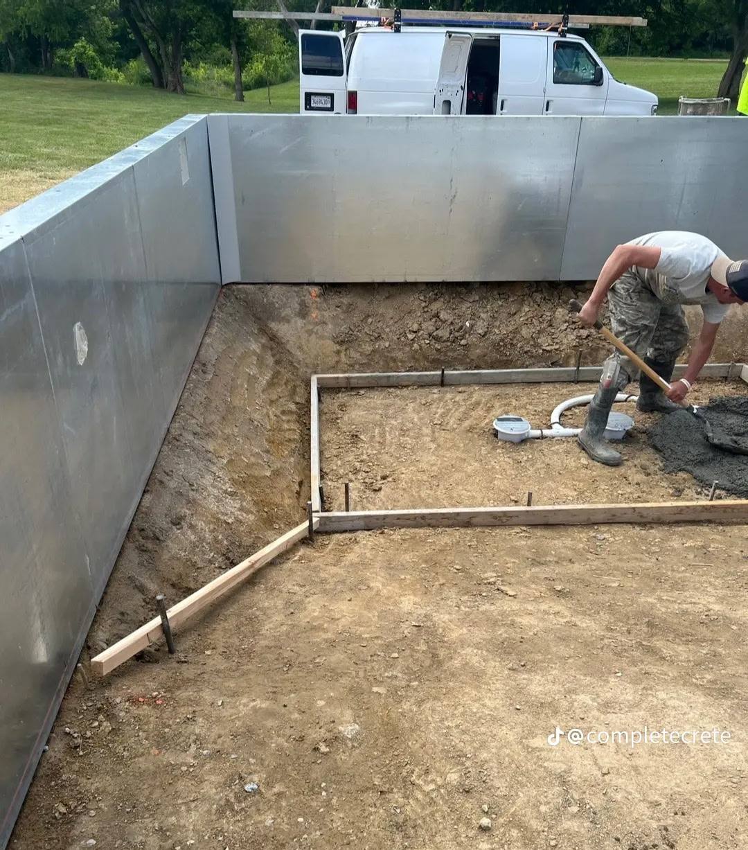 Pool shell with plumbing rough-in before the floor pour