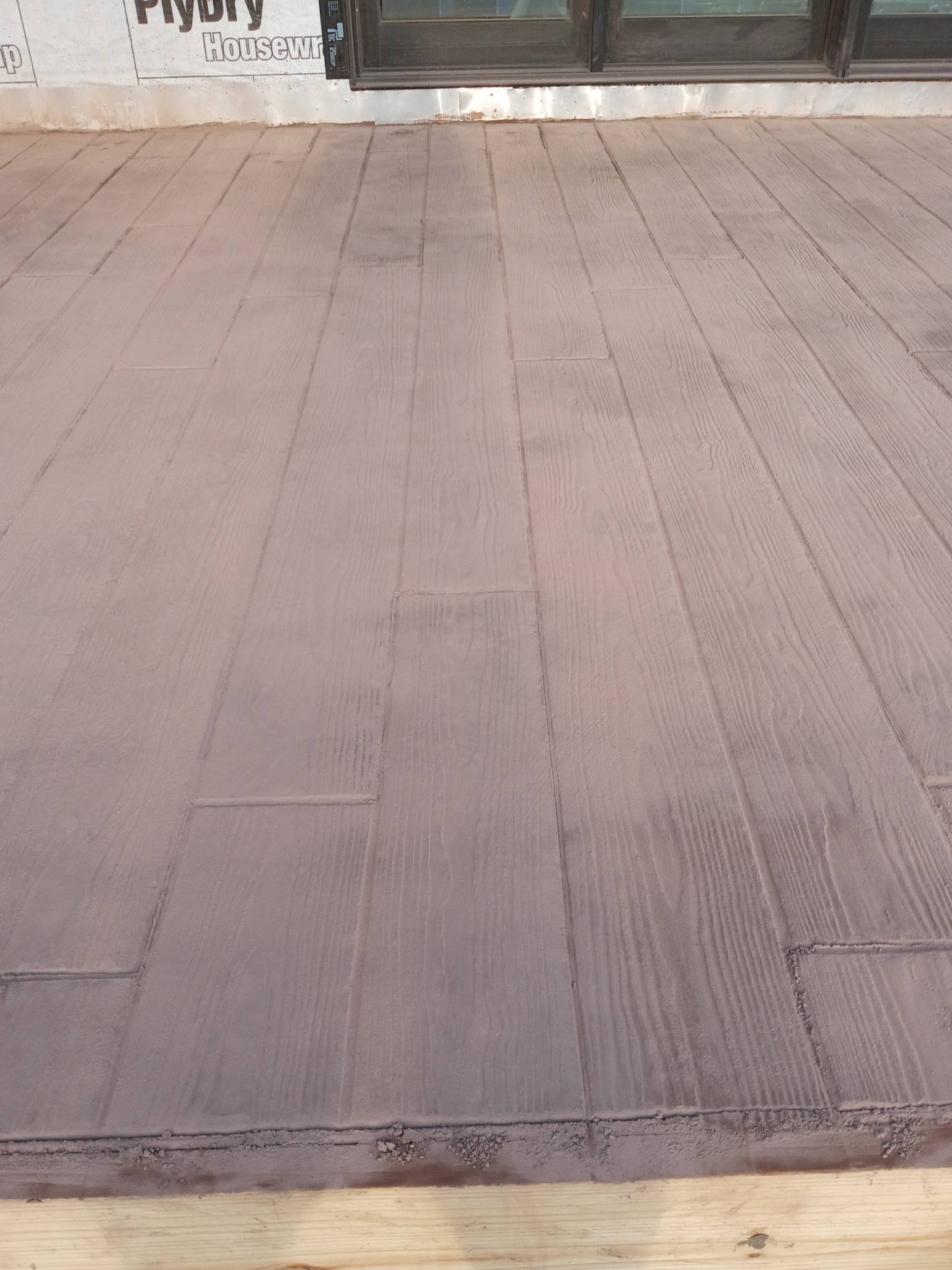Close-up of wood-plank pattern stamped concrete