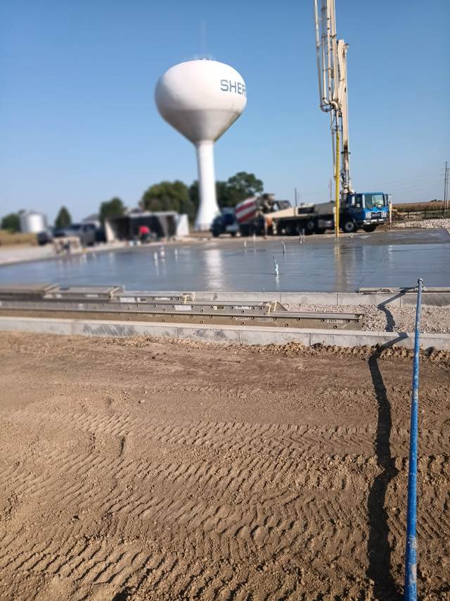 Commercial concrete slab pour with boom pump truck