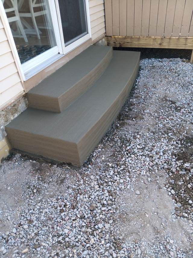 Freshly poured concrete entry steps