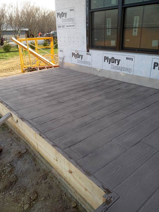 Wood-plank stamped concrete patio, gray finish